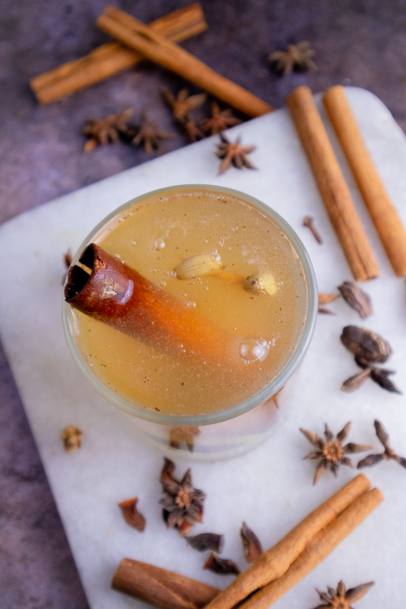 Top view of cinnamon tea with star anise and cardamom